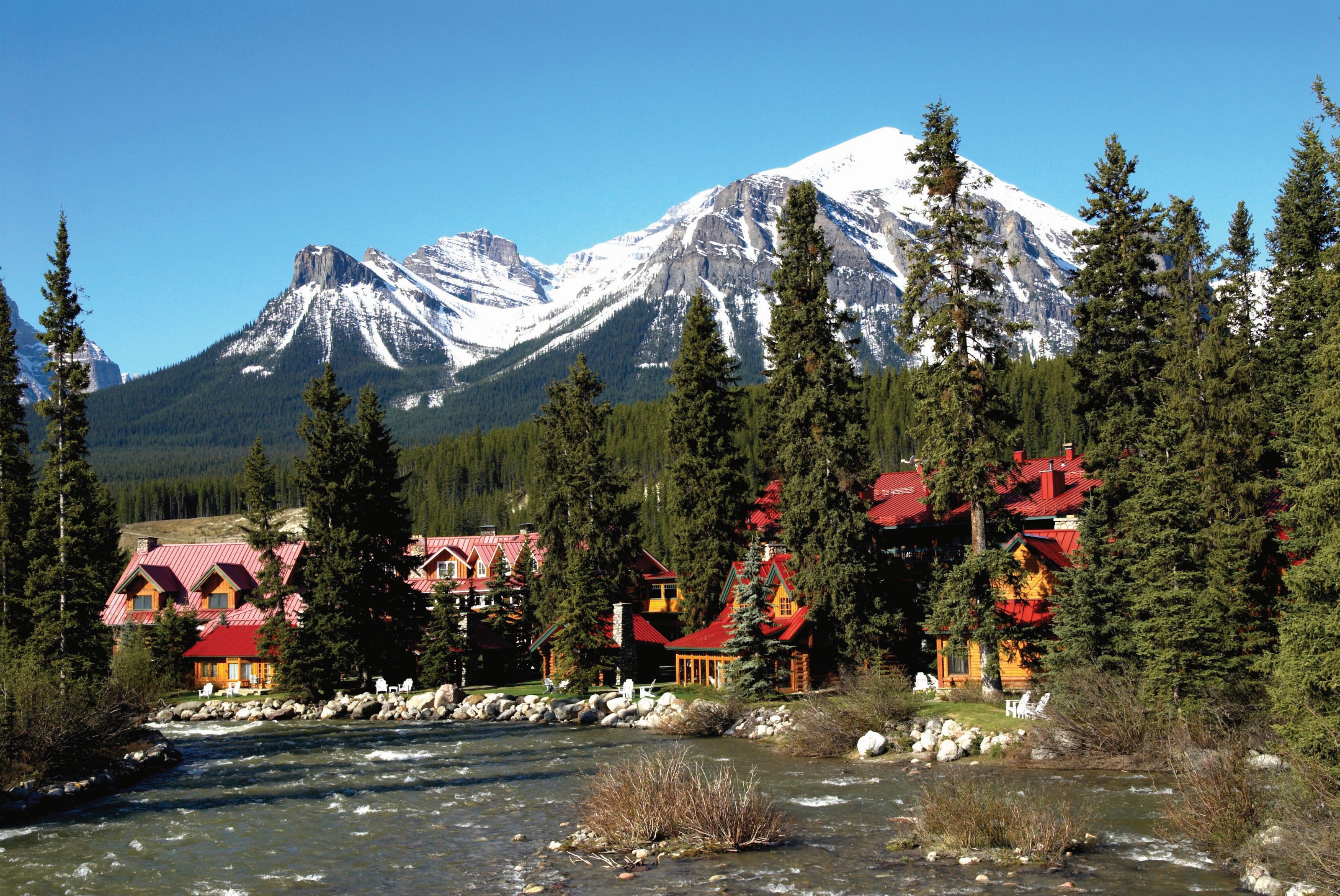 Xl Canada Lake Louise Post Hotel And Spa Exterior Summer Bow River